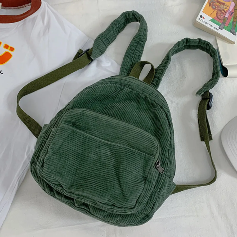 bdg corduroy mini backpack Backpack- Camel Includes a lined interior with a back slot and zippered pocket BDG Patchwork Mini Corduroy Backpack