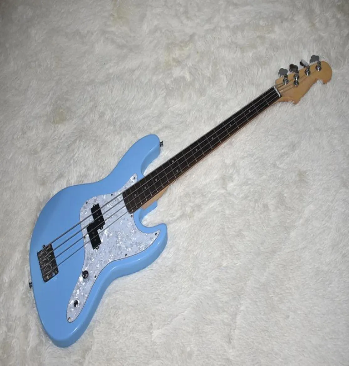 Factory Custom Sky Blue 4 strings Electric Bass Guitar with Rosewood FretboardWhite Pearl PickguardDots Fret Inlaybe Customized9568794