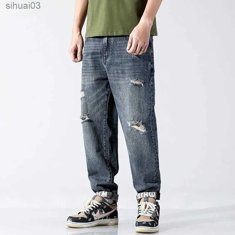 Mäns jeans Vackra vår- och sommarmärke riva av avsmalnande jeans gata hiphop trend herrar raka löst nio poäng byxor harem byxor l2403