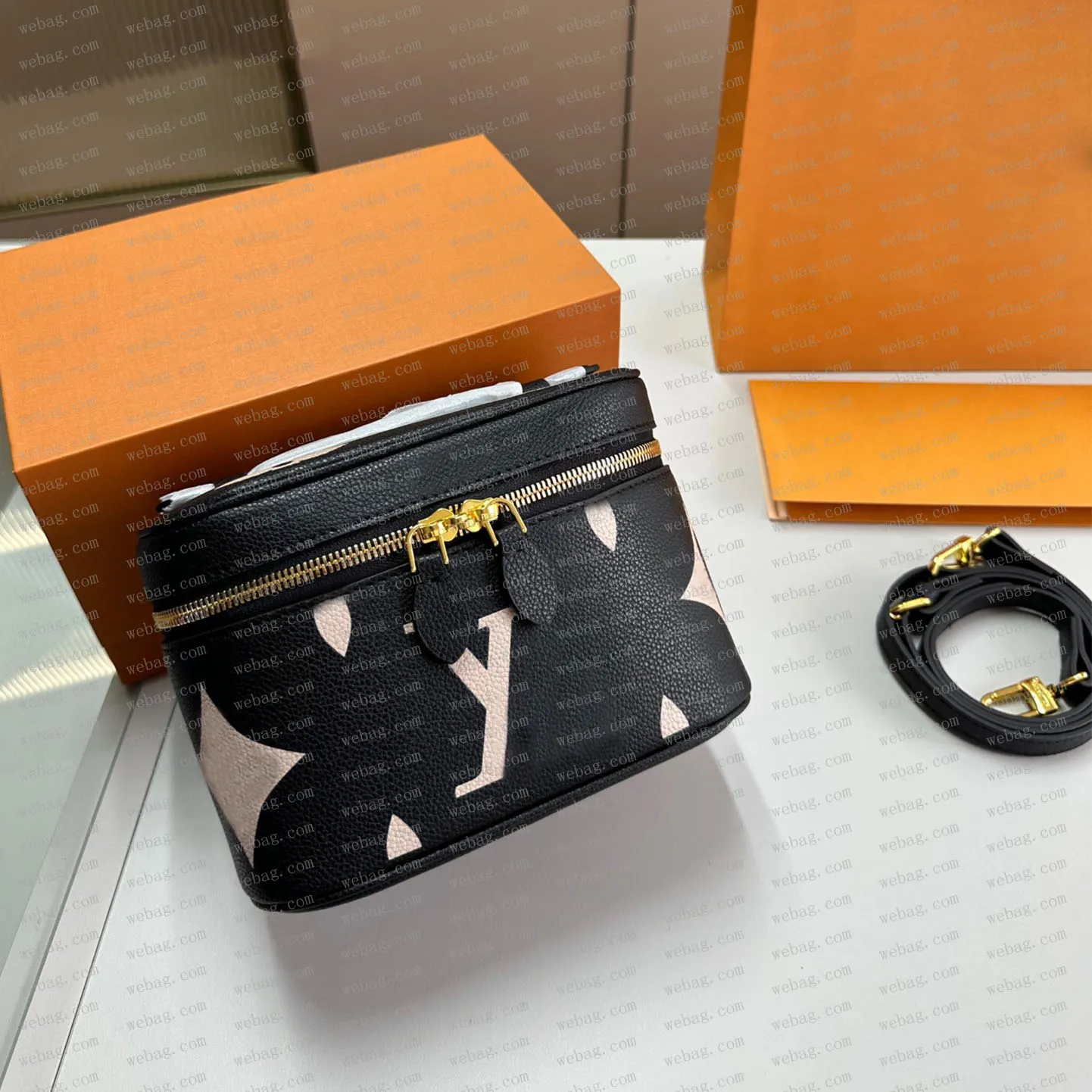 Toppkvalitet kvinnors kosmetiska väska lyxar på handväskor designer tvättpåse toalettråse kvinnor män äkta läder plånbok axel koppling smink väskor