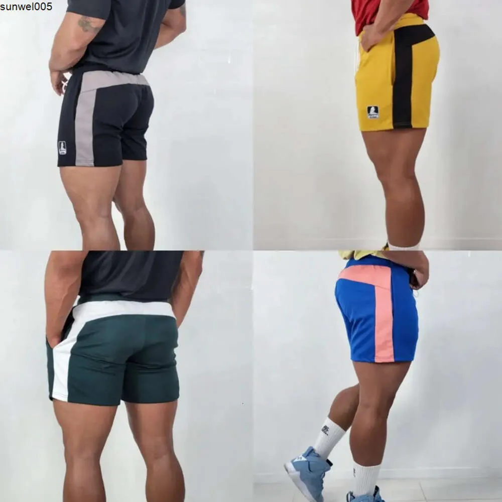 Les shorts de créateurs se vendent bien.Nouveau Pantalon pour hommes été recadrée élastique tissé
