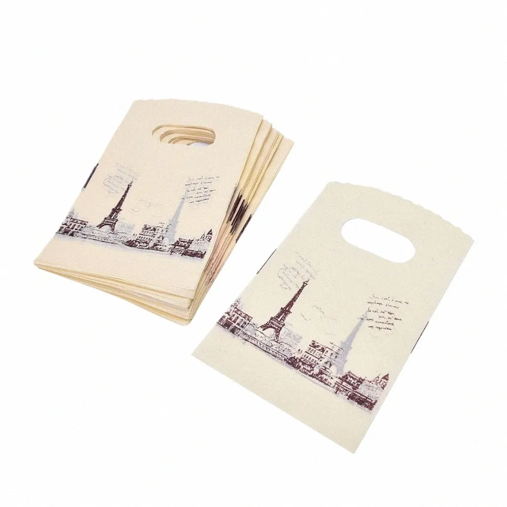 100pcs/lot Plastic Shop Bags Vintage Yellow Eiffel Tower Packaging Bags With Handle 9 x 15cm Wholesale P9h3#