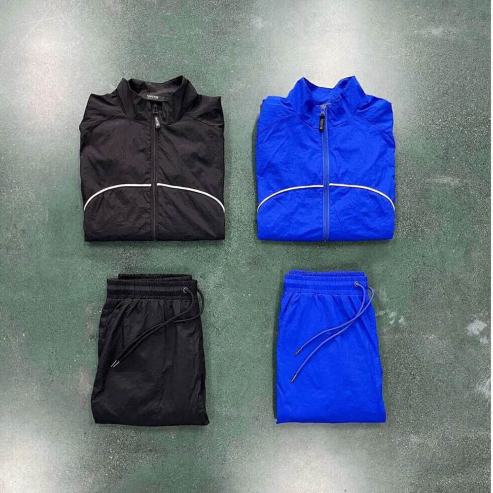 2024 Trapstar Ceket Trailsuit Erkekler Irongate Shell Suit 2.0 Versiyon Mavi ve Siyah 1to1 Kalite İşlemeli Yazı Kadınlar Ceket 1622ess