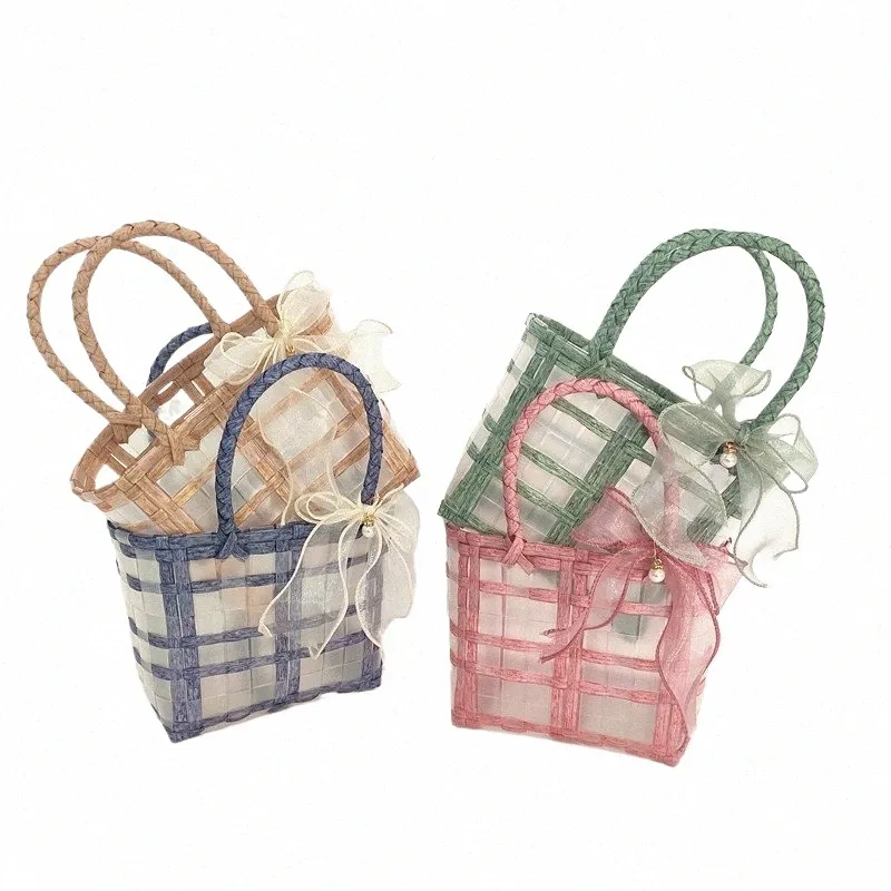 透明なプラスチック製の手織りゼリーバッグ再利用可能なギフトバスケットミニキェリー財布女性ハンドバッグガールズビーチバッグwith bowknot tulle x9ik＃