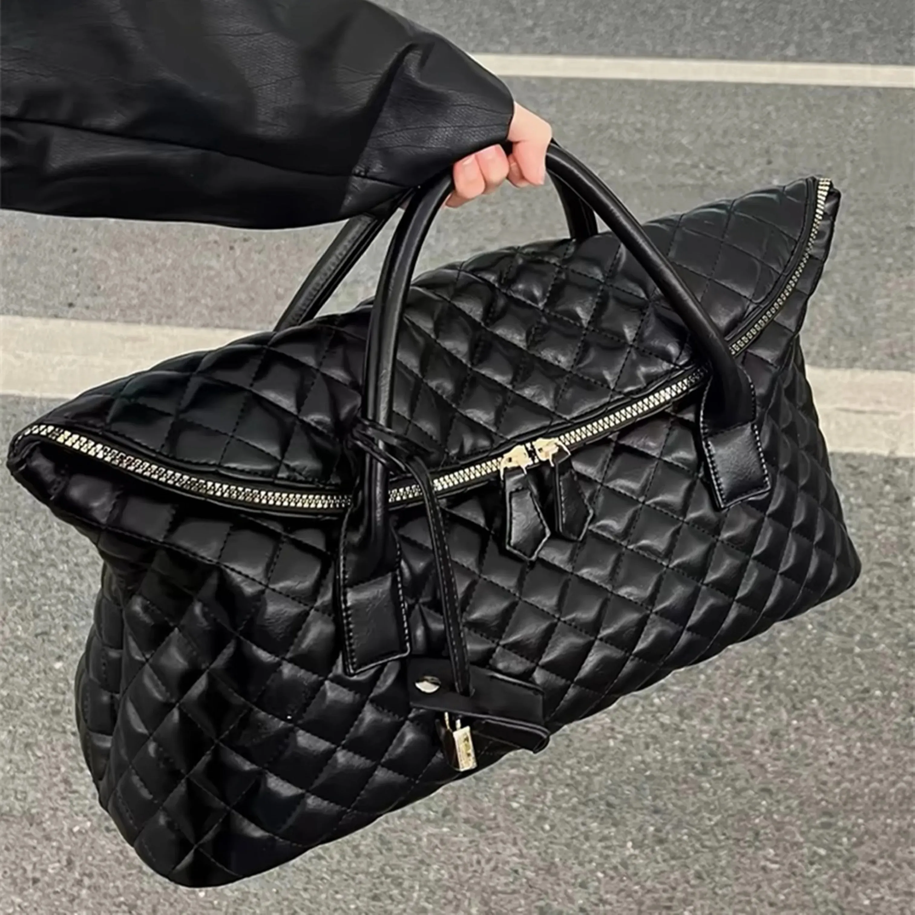 Topkwaliteit es gewatteerde lederen rompreizen mannen tophandgreep ontwerper lage koppeling handtas grote draagtas dames duffle mode dame crossbody schoudertas