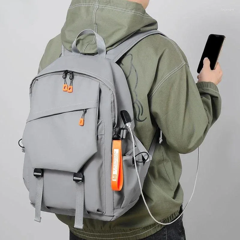 Mochila impermeable para hombre, morral urbano sencillo y sólido con USB, ligero, para ir al trabajo, portátil, tendencia, escolar