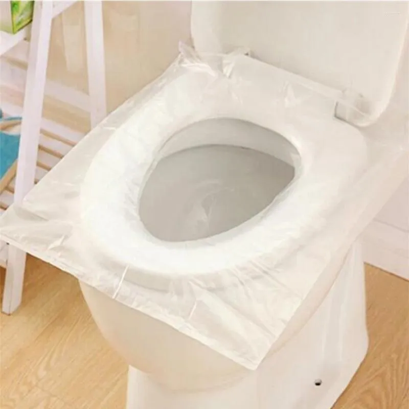 Couvre-sièges de toilettes 50pcs coussin protecteur jetable portable emballé individuellement imperméable universel pour adultes et enfants