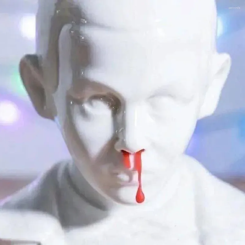 Portacandele Candeliere in resina Parodia Figura Design Flusso di cera Foro Testa Scultura Bianco Sangue dal naso Ufficio