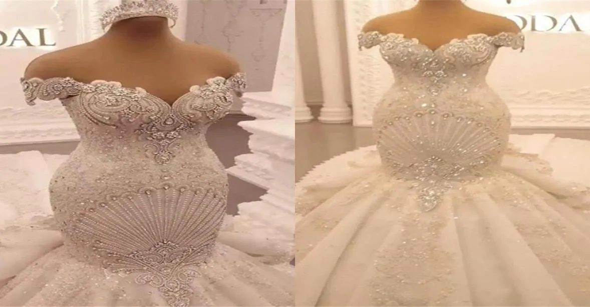 Luxury Appliques Lace Mermaid Wedding Dresses 2022 Princess Off Shoulder Crystal Backless Ruffles cathedral train Arabic Dubai Bri7630316