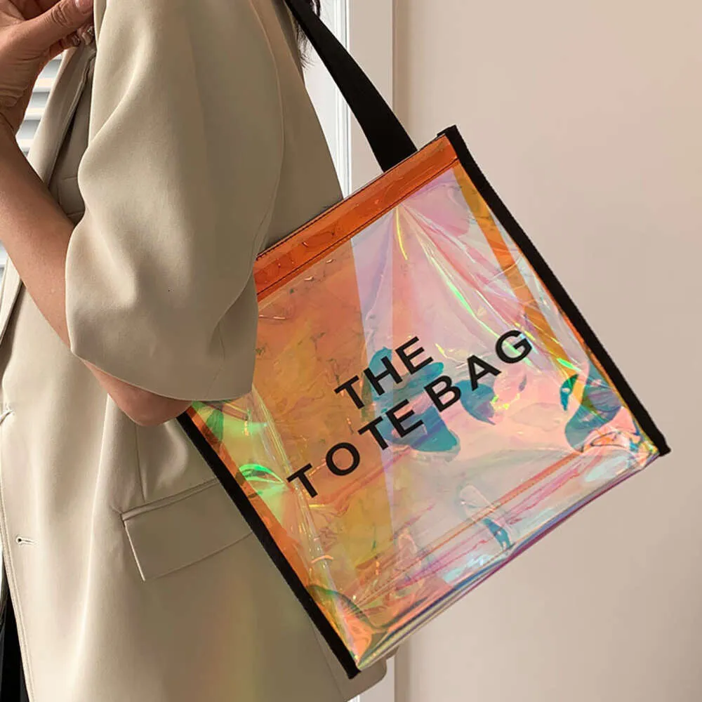 2024 Sac laser en PVC Sac en plastique transparent Sac Fashion grande capacité Sac à provisions étanches d'été Sac à l'écoute pour femmes