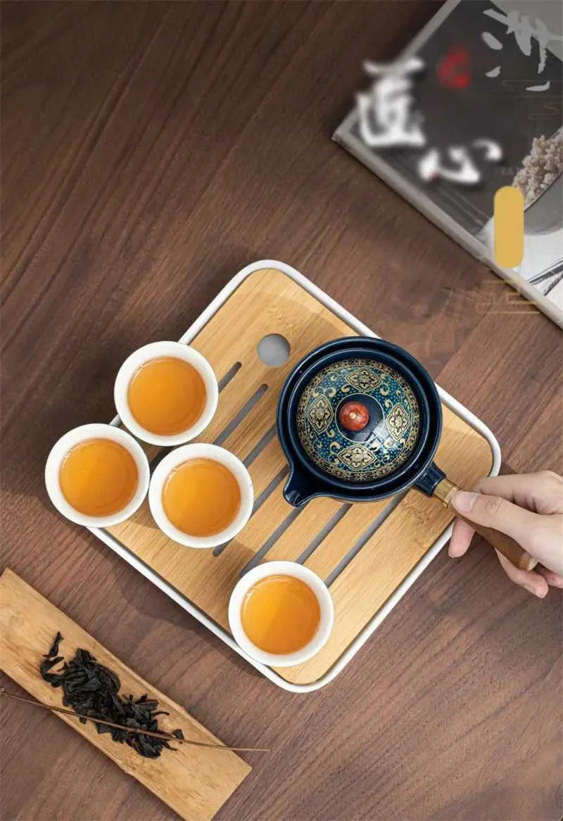 DHgate.com:Portable Tea Set: Ceramic 360° Rotation Tea Maker