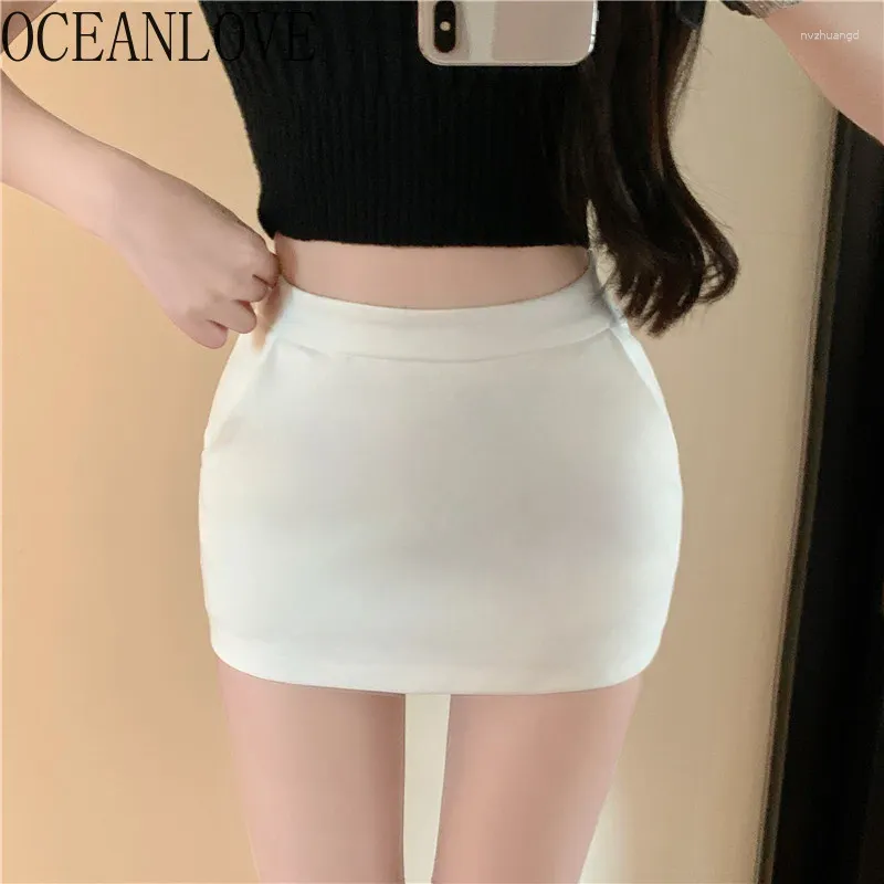 Kjolar oceanlove sexig mini solid vår sommar koreansk mode hög midja smala faldas mujer a-line enkla kvinnor kjol