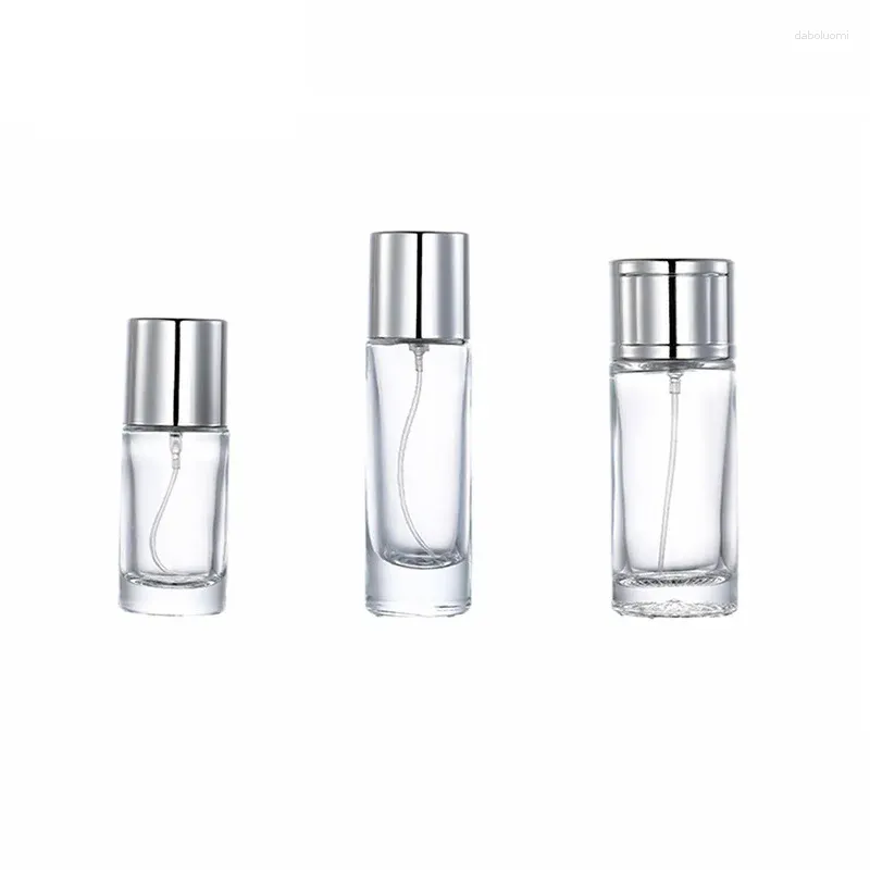 Butelki do przechowywania 10pcs przezroczyste butelki szklane perfumy 20 ml 30 ml 50 ml okrągłego kształtu Parfum srebrna pompa sprayowa napełniana kosmetyka fiolki mgły kosmetyczne