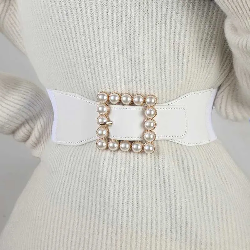 أحزمة حزام المرأة على غرار Instagram نمط من المألوف وحزام لؤلؤة الديكور البسيط والرغبة مع سترة مرنة أسود واسعة