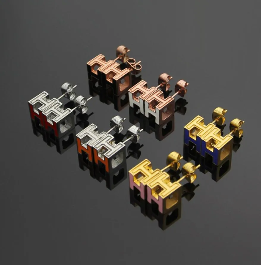 Nova chegada da moda Lady Titanium Six Color esmalte o engajamento de letra cúbica 18k Brincos de ouro 3 color4449506