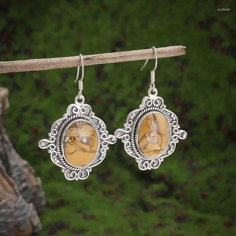 Boucles d'oreilles en pendaison rétro et élégants pendentifs en pierre ambrée adaptés aux dames après l'après-midi