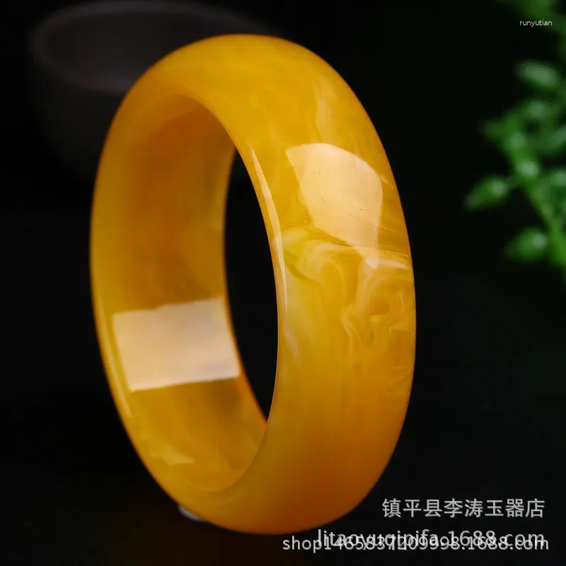 Bangle Factory Directe levering Baltische oude bijenwas Amber Kip Oil Geel Lady Dames Bracelet Fluorescerende zweven