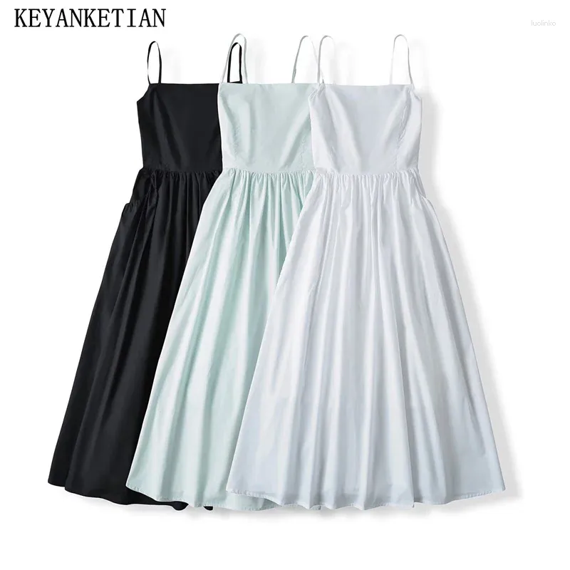 Casual Dresses Keyanketian 2024 Launch Holiday Wind Cross Soe Up Backless Slip Dress Women's Solid Color Slim Elastic Midje Midi