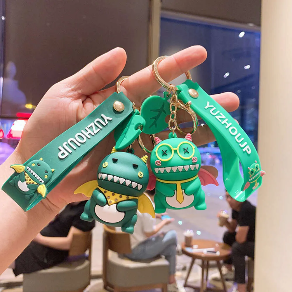 Dinosaurio Silicone Doll Keychain Cartoon Metal Key Pending Lindo Bolsas Costillas Creativas