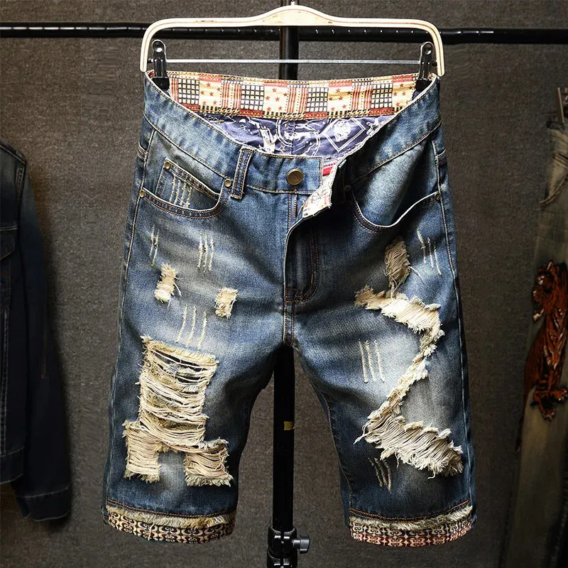 2024 Zomerheren scheurden korte jeans streetwear Big Hole mode vintage blauw slanke denim shorts merk kleding 240422