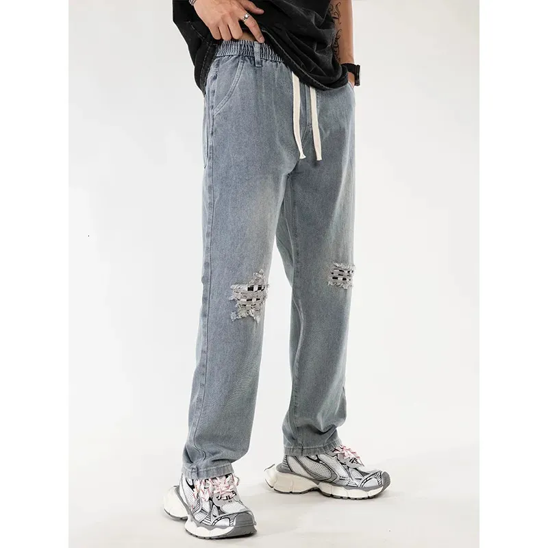 Y2K jeans largy jeans maschile a scacchiera in tessuto pantaloni vintage pantaloni in vita cohinding dritte casual denim 240426