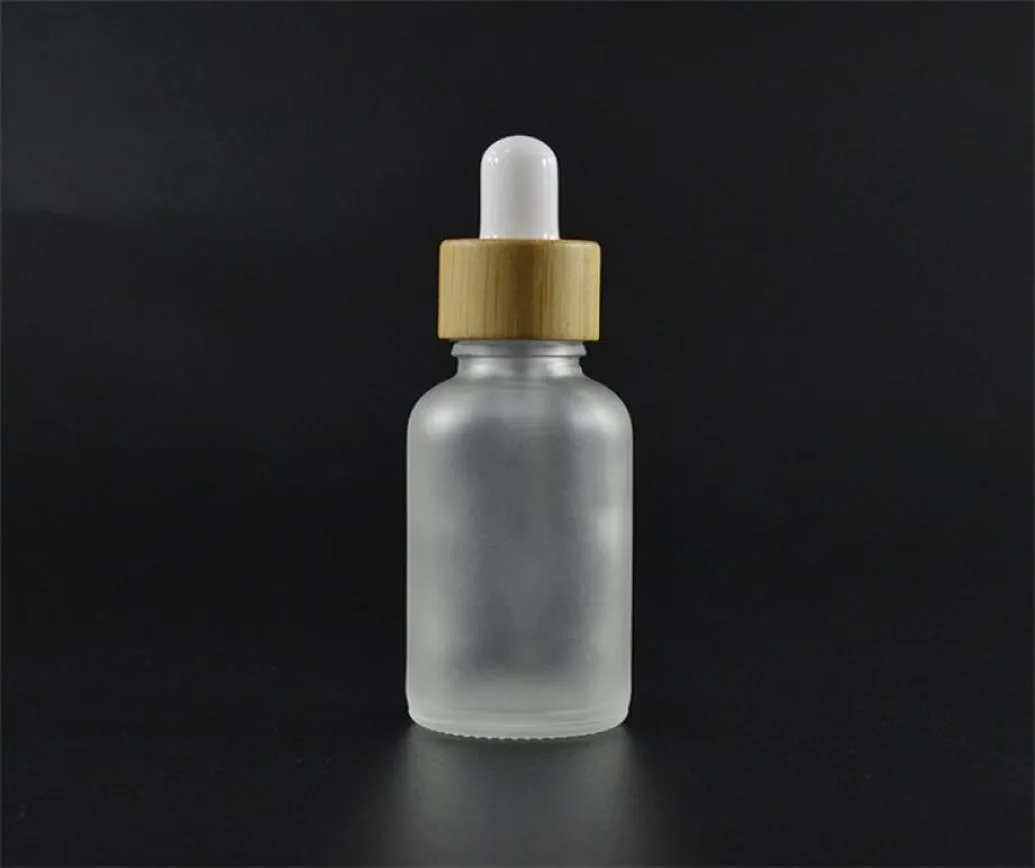 Bottiglia di contagocce in vetro ad olio essenziale con bottiglia di siero di bambù di bambù in bambù Amber blu verde glassata trasparente 10 ml 15ml 20 30ml 50ml 21 G25107149