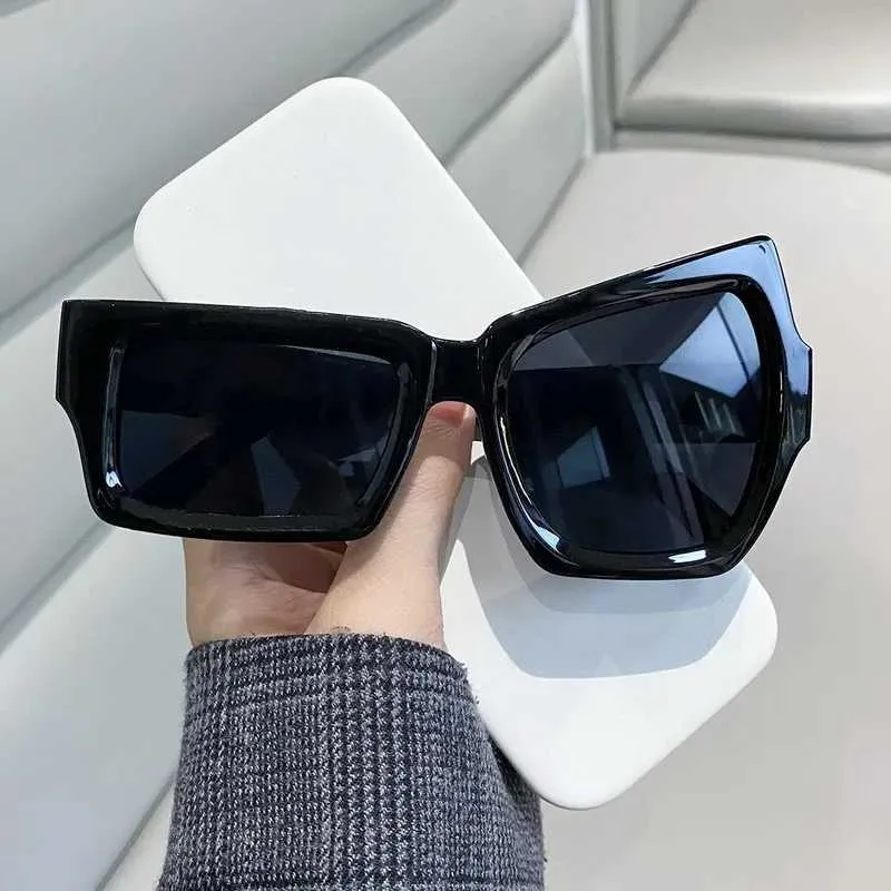 Okulary przeciwsłoneczne FN1I Nowe modne kwadratowe okulary przeciwsłoneczne zabawne impreza asymetryczne okulary słoneczne mężczyzn projektant marki osobowość czarne Oculos de Sol D240503