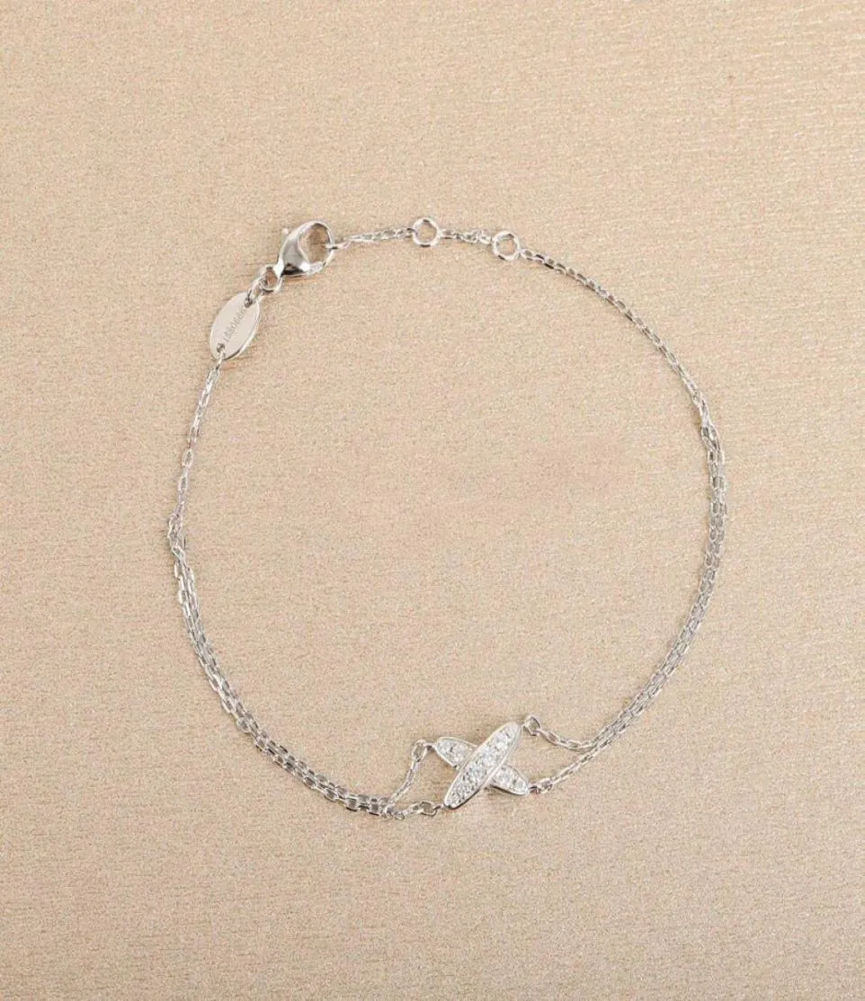 S925 Silver Charm Corss Style Armband med diamanter för kvinnor Bröllopsmycken gåva har stämpel i två färger pläterade PS823615678618169235