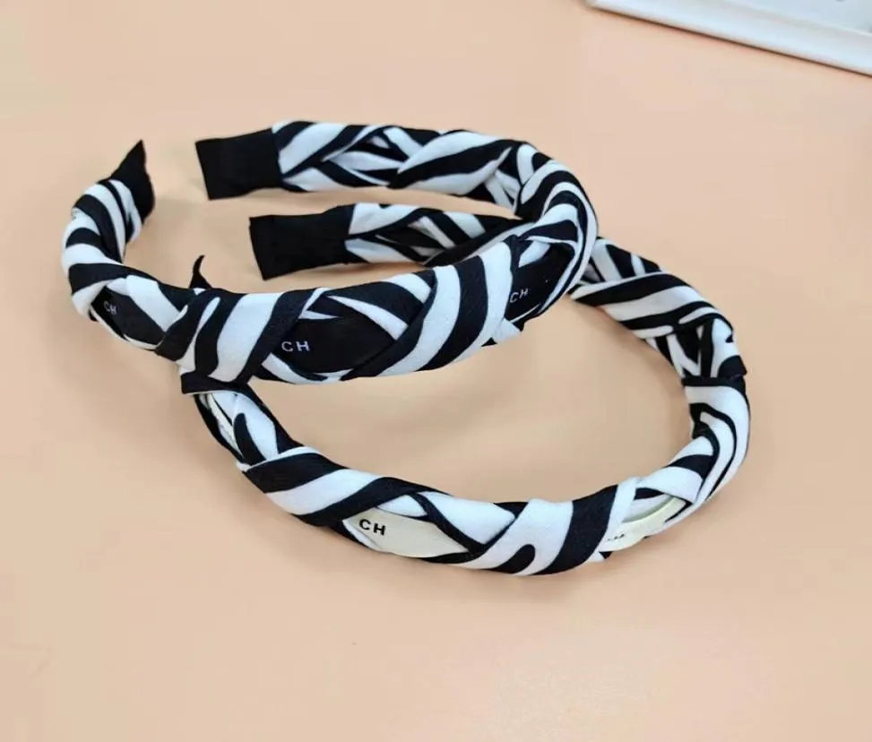 Black White Women Designers Hoofdbanden klimmen print vrouwen hoofdband C065 meisjes gemengd patroon headwraps haar hoepel sport accessorie8469293