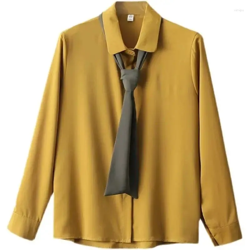 Boulons pour femmes Fashion Couleur solide Bouton épissé Lacet Up Bow Shirts Female Vêtements 2024 AUTOMNE HIVER LOBE CORÉAN TOPS BUREAU