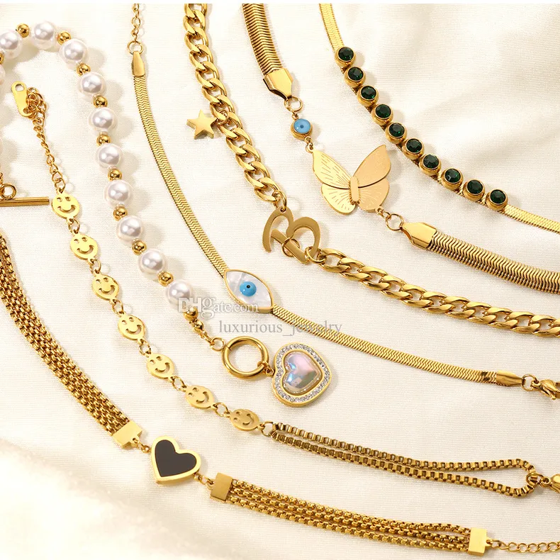 Desinger Gold Chains Bachelet for Women Zircone a forma di cuore Pearfalla fascino per farfalla a sospensione Bracciale all'ingrosso gioielliere all'ingrosso