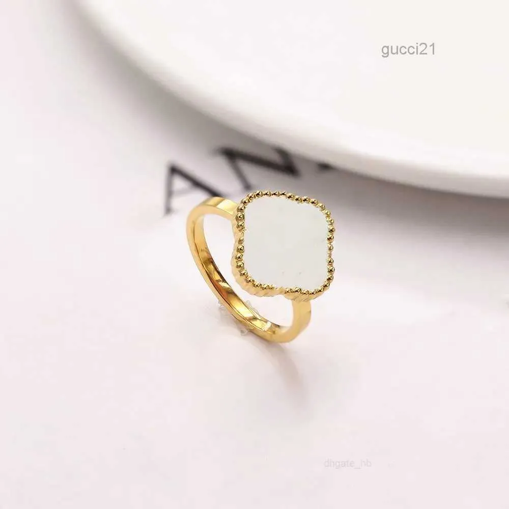 Luxury Ring Clover Rings Designer för kvinnor mode smycken kvinna pläterad 18k guld blå grönt skal diamantring bröllop ringar kinesisk gratis frakt zdw5