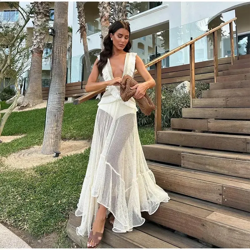 Summer Beach Party White vest dress: Women's Deep V-neck Irregular Pleated Hollow Dress with Tassel Detailing - Sleeveless and Backless Summer Beach Party White vest dress: Women's Deep V-neck Irregular Pleated Hollow Dress with Tassel Detailing - Sleeveless and Backless