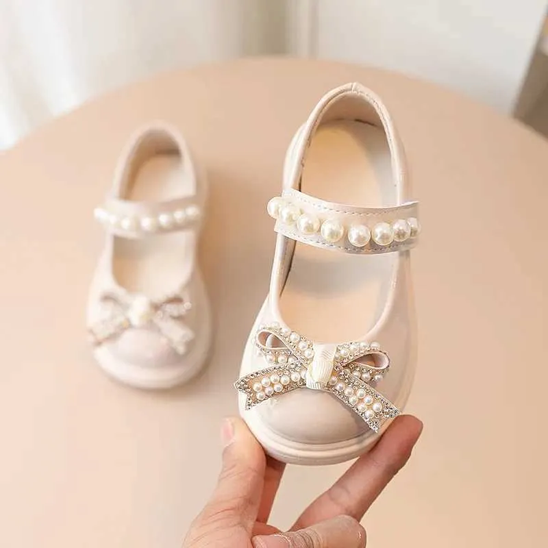Flat Shoes Kids Fashion Pearl boog knoop pu lederen prinsesschoenen voor meisjes lieve baby ondiepe mond Mary Jane H240504