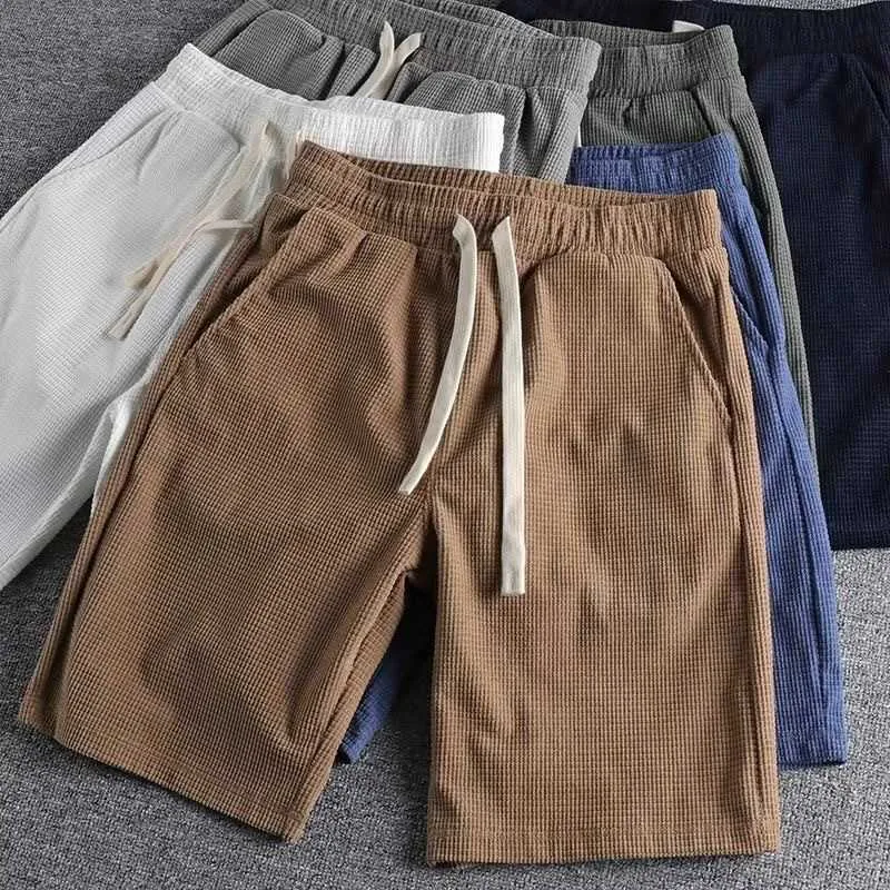 Lente en zomer vaste kleur werkkleding shorts heren trendy Instagram los rechte been broek casual veelzijdige Capris Beach