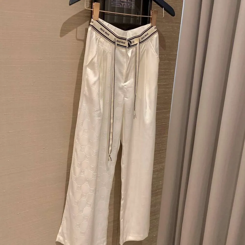 MM Family 24ss Nowy list Jacquard Waist Riast Riast Casual Women's Fashion Wszechstronne proste spodnie dla kobiet