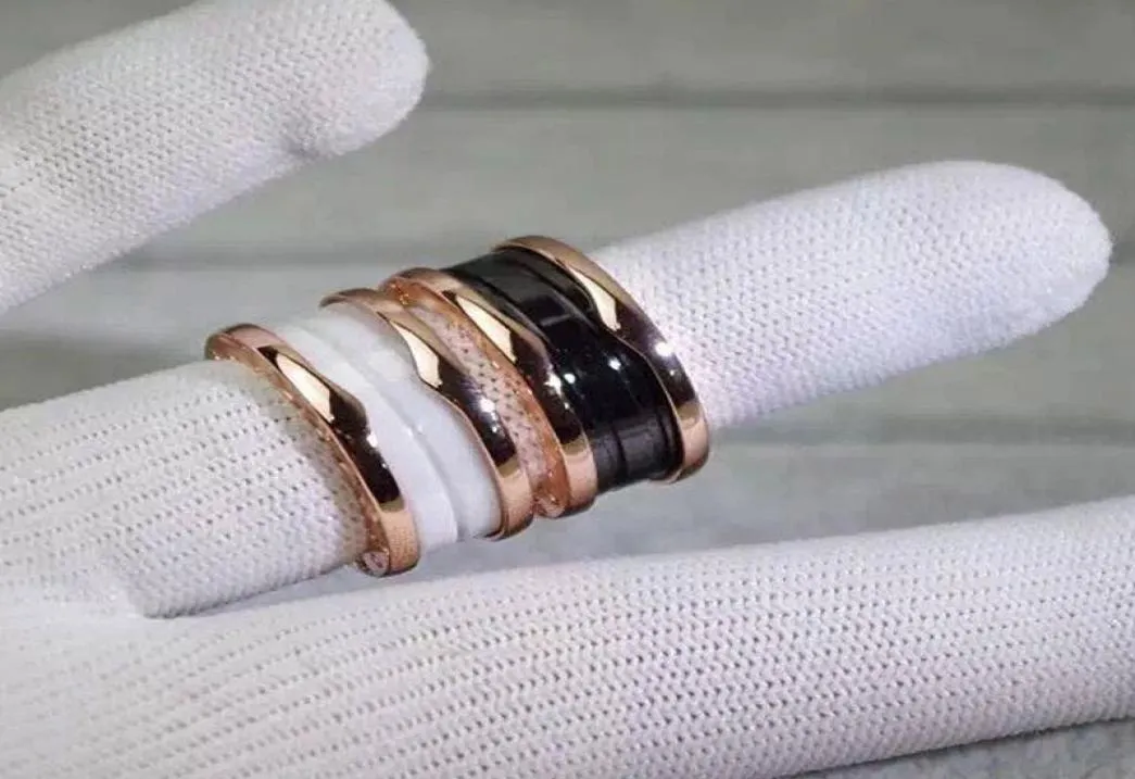 Projektant biżuterii 2019 Nowy pierścień mężczyzna Kobieta Rose Gold Black and White Line Ceramic Ring Para Biżuteria Luksusowa stal ze stali nierdzewnej Punk ST2969074
