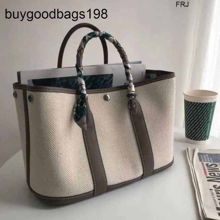 Designer Garden Bags Tote Brand 2024 Nuovo tela con borse da donna in pelle vera e propria a strato a strato