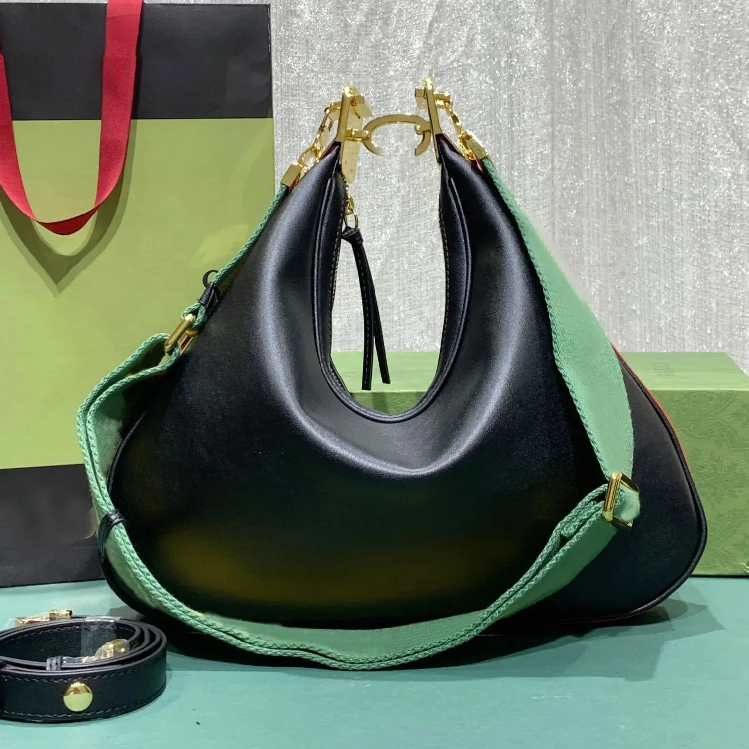 Fashion designer bag Hobos Totes women's leather shoulder bag with colorful striped nylon strap and metal brand logo hook handbag
