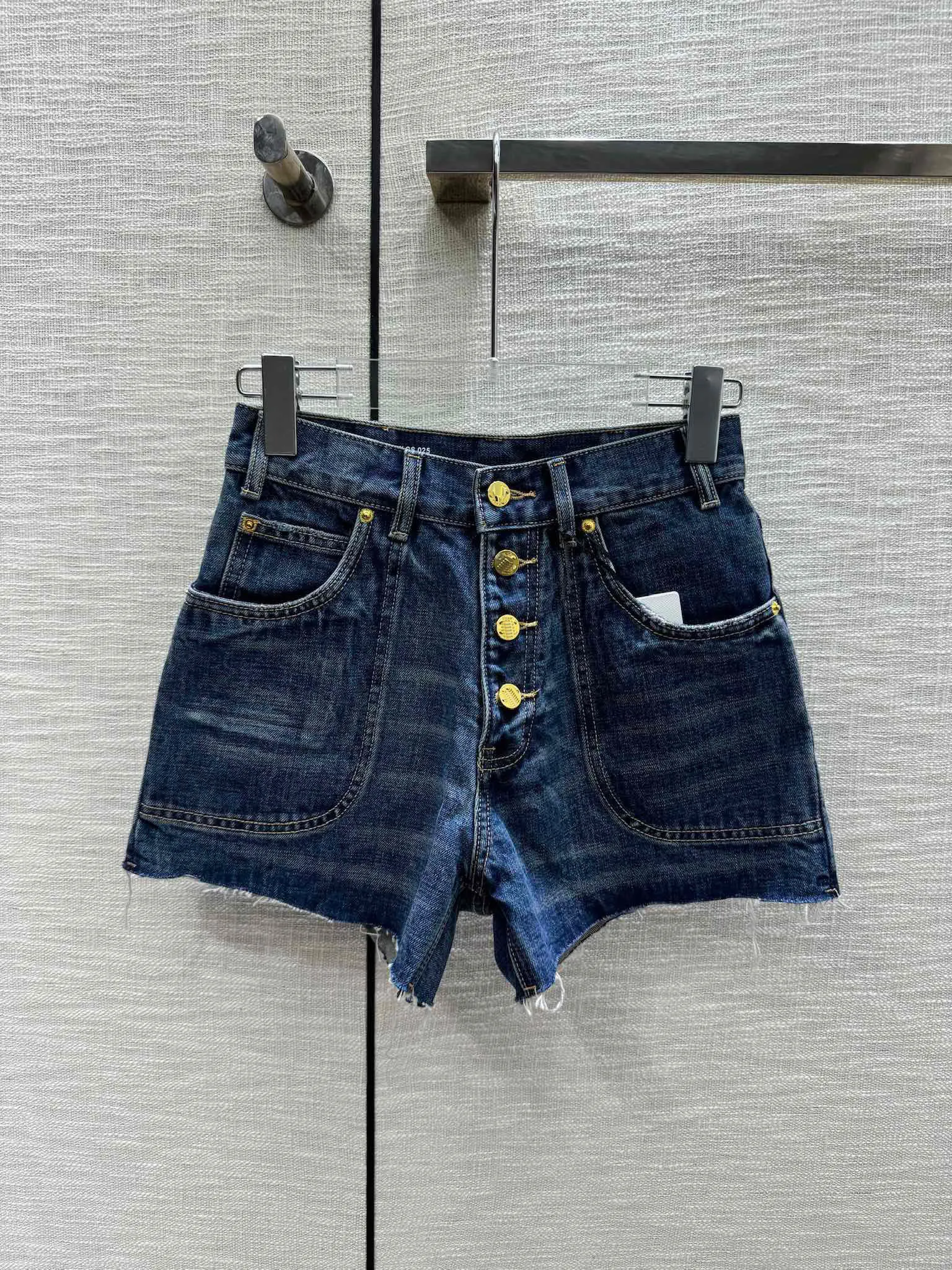 2024 Nouvelle mode d'été Shorts denim à poitrine simple Femmes Femmes hautes Poches de couleur bleue