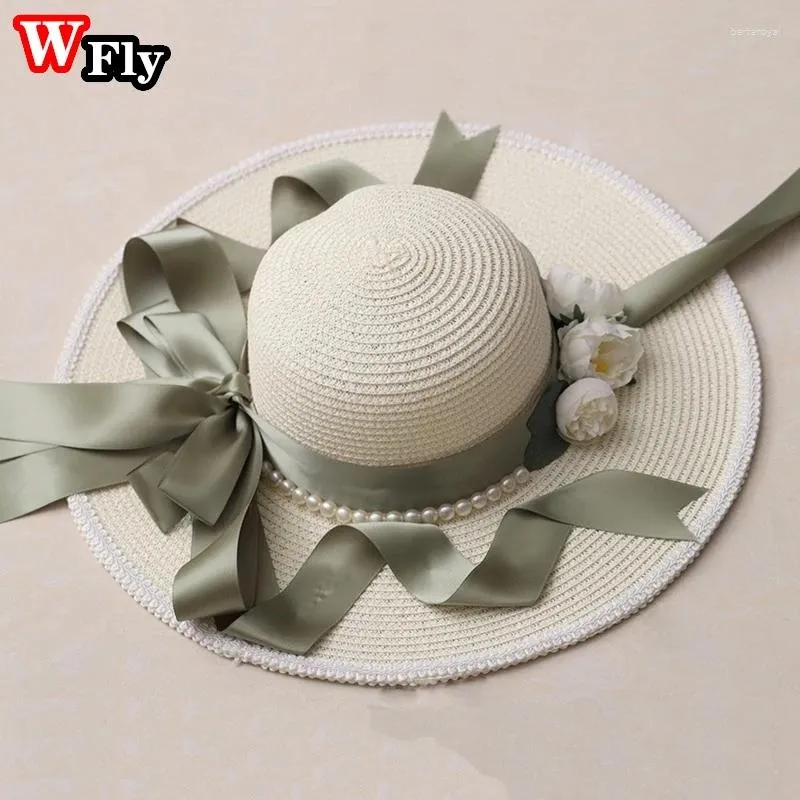 Berets Harajuku Dames Girls Summer Straw Sun Hat Sweet Lolita Cosplay Lace Bloem Bandage brede rand Bowknot Elegante hoeden Vrouw