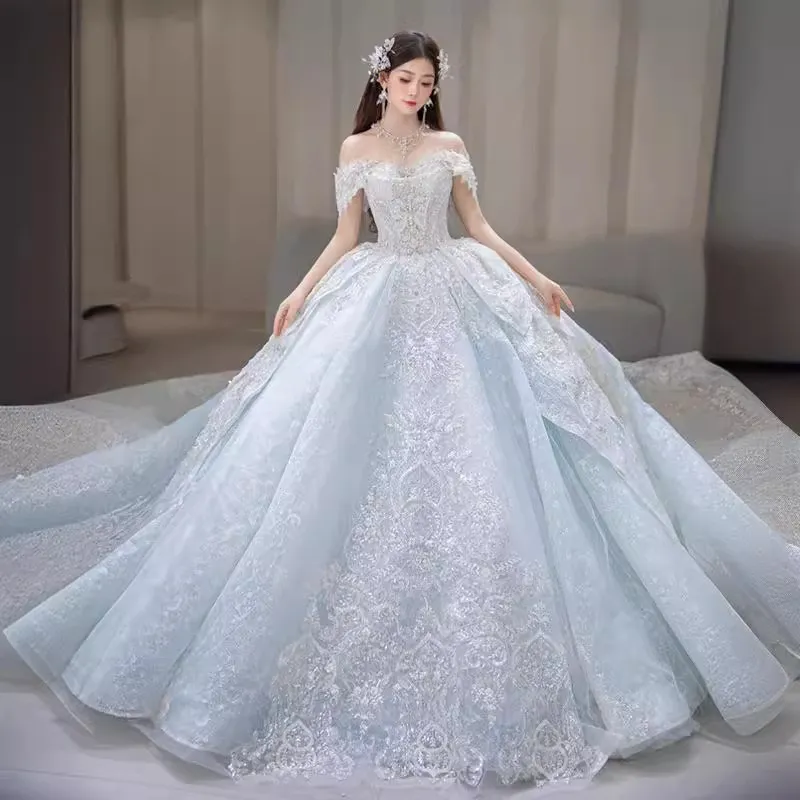 2024 Robes de mariée princesse au large des épaules perle illusion à manches florales jupe en cristal de dentelle sexy