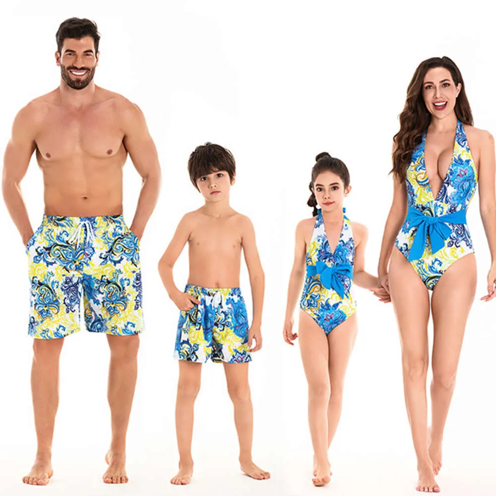 Swimwear masculin 2024 Parent Child Mains de maillot de bain Portez une nouvelle mère fille bikini père fils de plage pantalon élastique Famille de quatre ans
