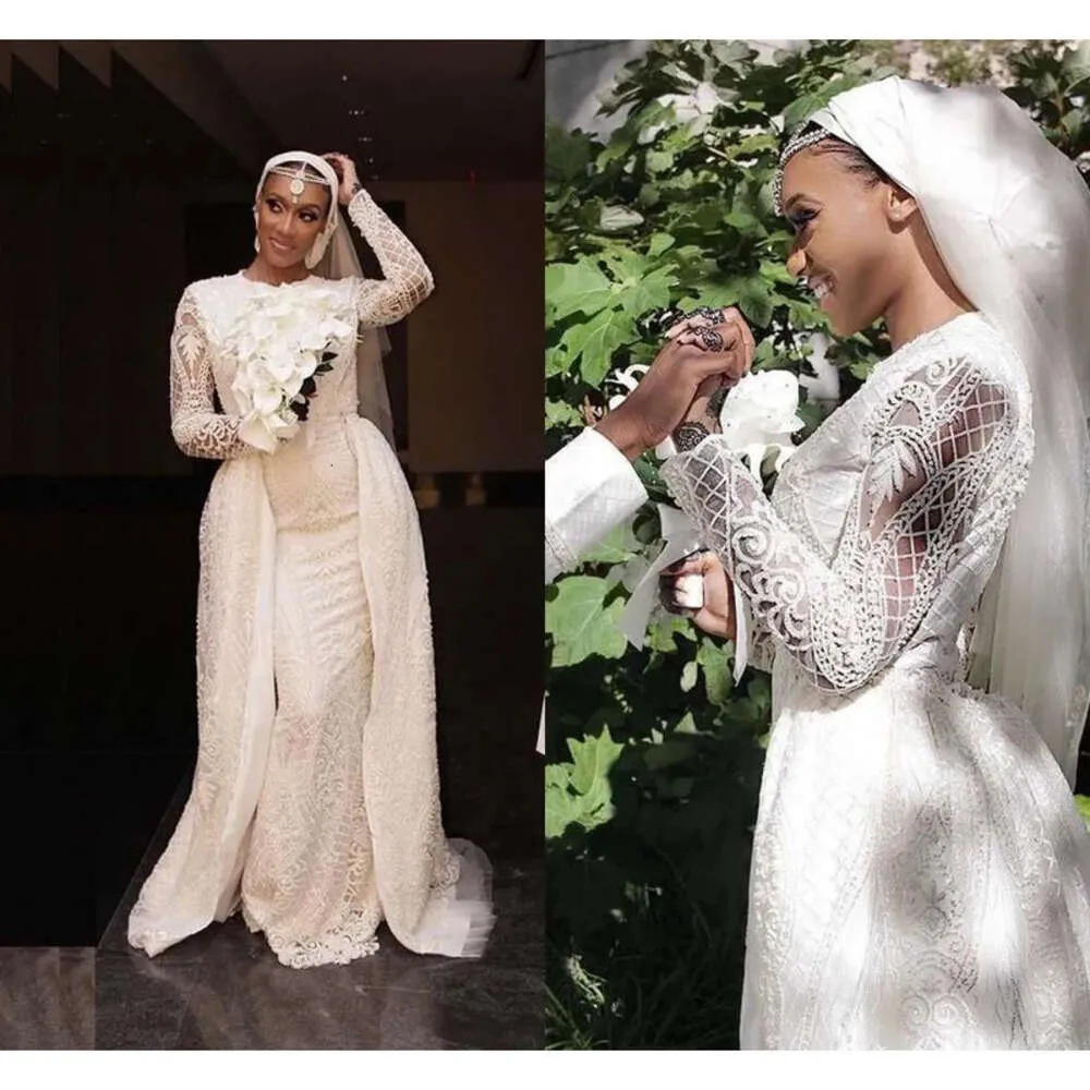 Mermaid Dubai Dresses Arabic 2021 con maniche lunghe in pizzo Overskirt perle gioiello fatto da sposa da sposa da sposa da sposa