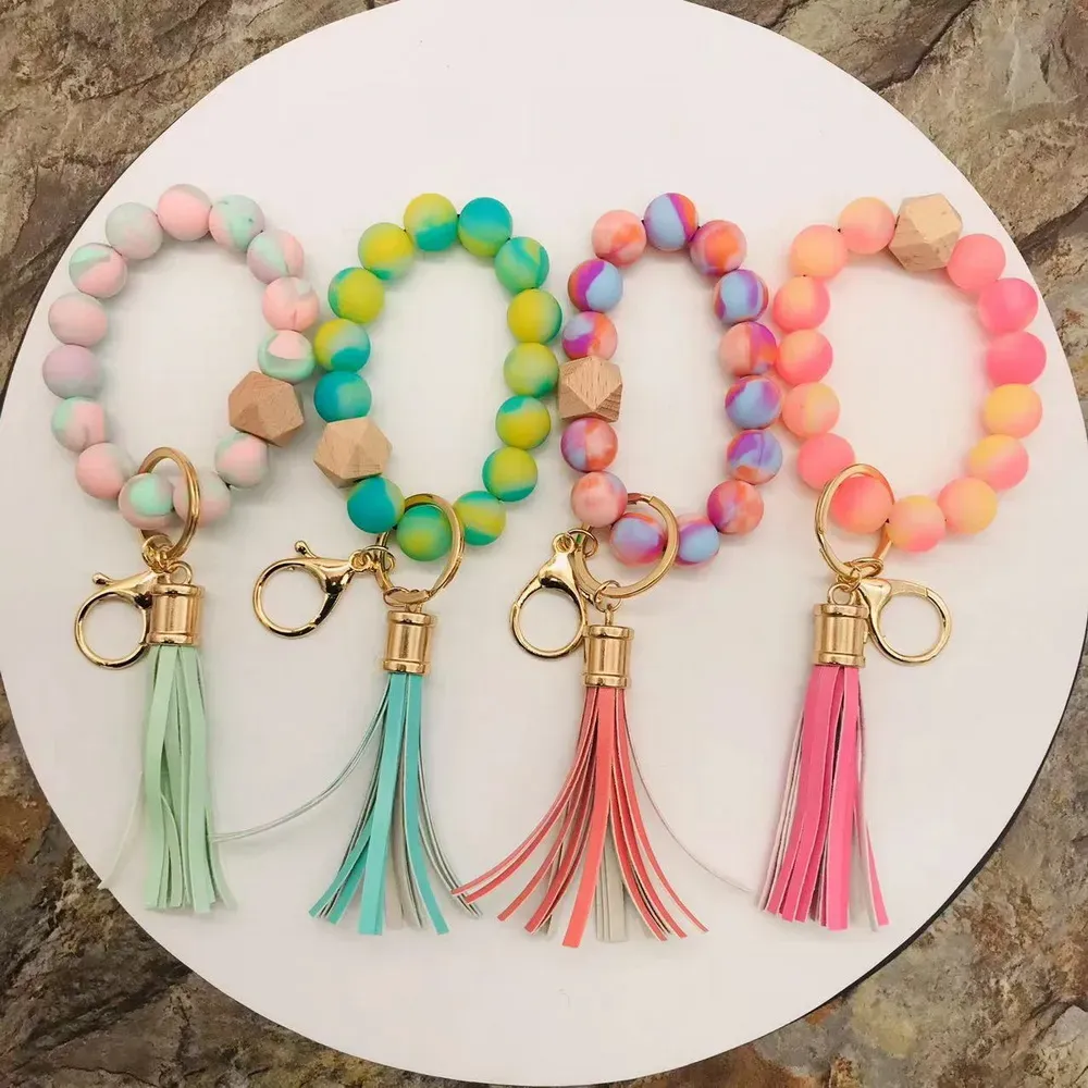 Handmade stretched spring rainbow silicone beads bangle keychains pu leather tassel wristlet bracelet keyrings for 2022