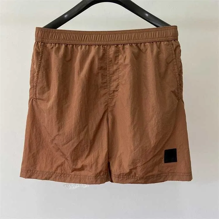 Shorts masculinos de nylon de nylon de nylon shorts de pedra de nylon de bolso de bolso de bolso de bolso de gola de bolso esportivo curto para menqda9