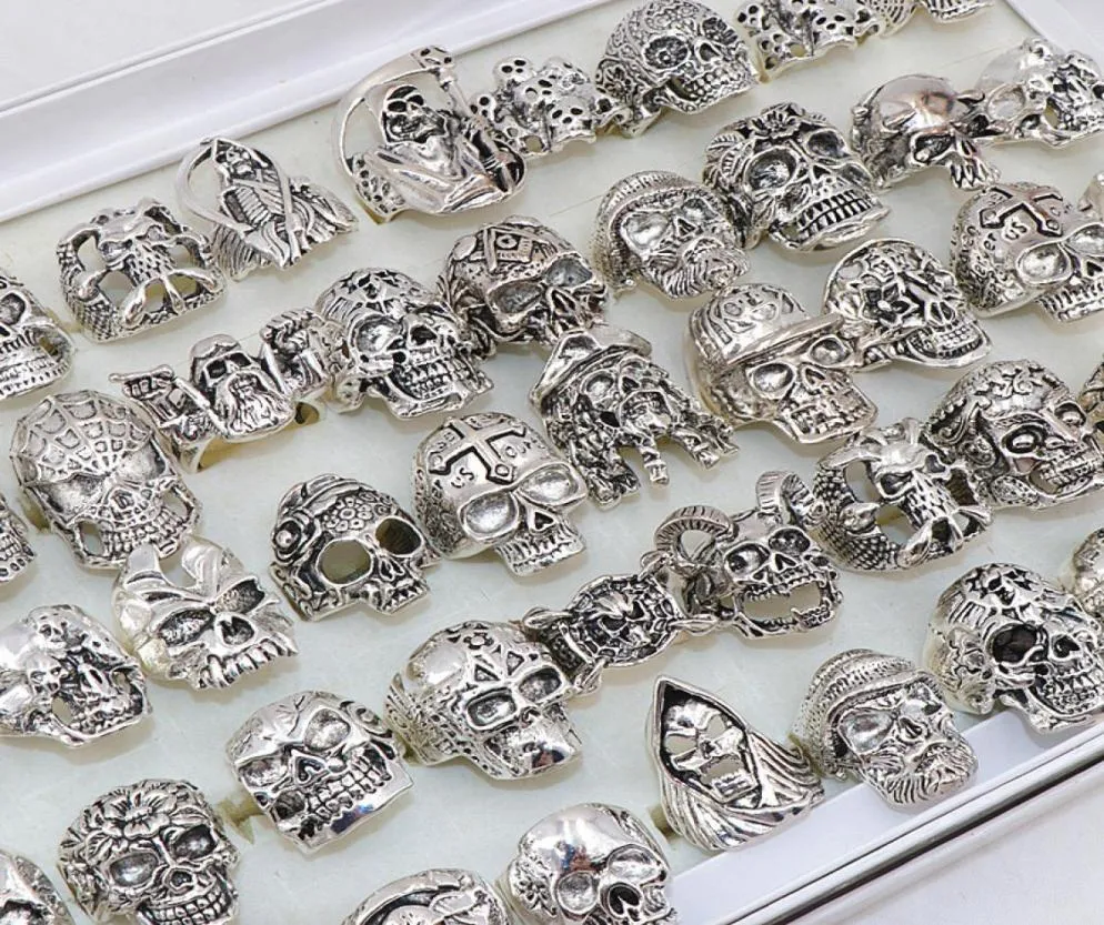 Whole Bulk 50pcsLots Punk Metal Skull Rings For Men Women Size 8 to 11 Mix Style5363727
