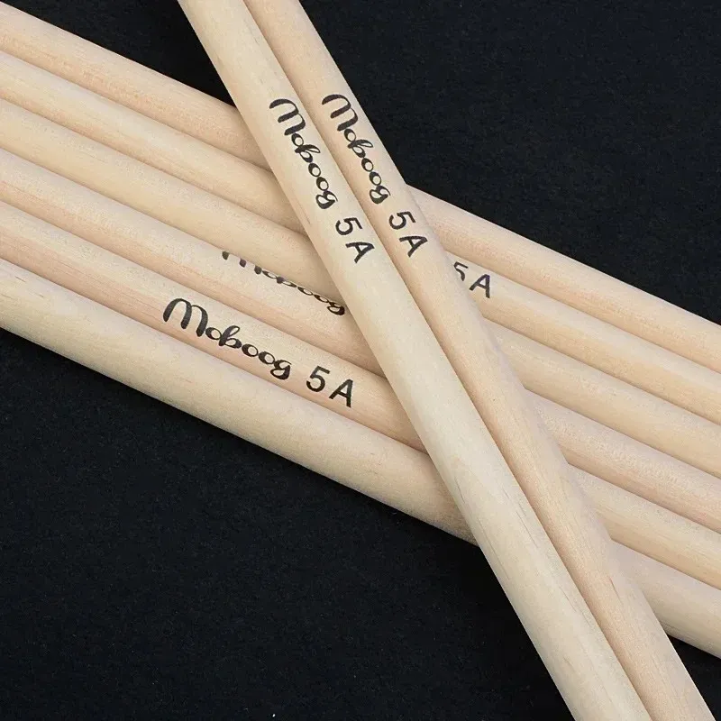 1 par de palitos de batería de madera de madera de arce para principiantes accesorios de batería banda de instrumentos musicales Drumsticks Drum Wrap