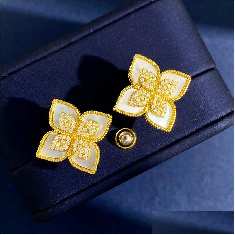 Stud Lucky Clover Designer örhängen för kvinnor 18K guld lyxig ihålig söt blomma bling diamant örhänge öronringar öron smycken dro dhqdr