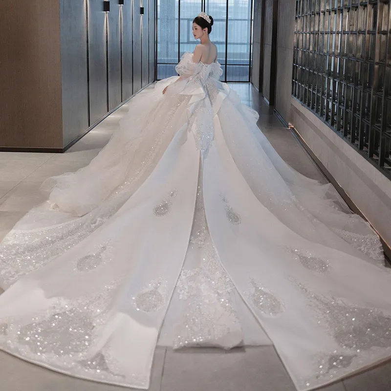 liniowe ślubne sukienki długie seksowne aplikacje na ramię cekiny 3D Diamenty koronkowe fałdy z koralikami długość podłogi suknie ślubne na zamówienie abiti da